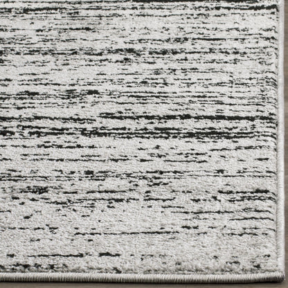 SAFAVIEH Area Rug 9x12 - Adirondack Collection - Large - Silver & Black, Modern Ombre Design, Non Shedding & Easy to Clean, Ideal for Living Room, Bedroom, Office, Dining Space (ADR113A)