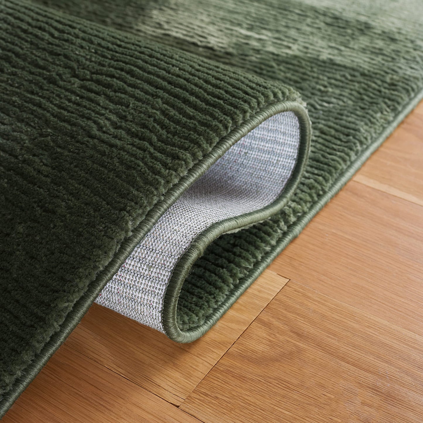 SAFAVIEH Revive Collection Area Rug - 5'3" x 7'7", Green, Solid Design, Non-Shedding & Easy Care, Ideal for High Traffic Areas in Living Room, Bedroom (REV102Y)