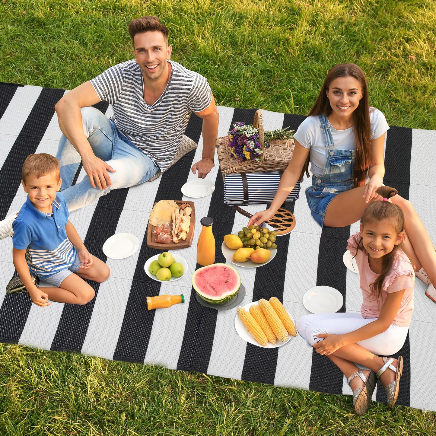 Strickland Home Outdoor Rug 6 x 9 ft, Reversible Plastic Straw Rug for Patio, Waterproof Large Outdoor Carpet for RV, Patio, Camping, Backyard, Deck, Picnic, Beach, Black & White