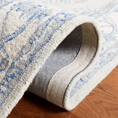 SAFAVIEH Area Rug 8x10 - Micro-Loop Collection - Large - Light Blue & Ivory, Handmade Wool, Ideal for Living Room, Bedroom, Office, Dining Space (MLP536L)