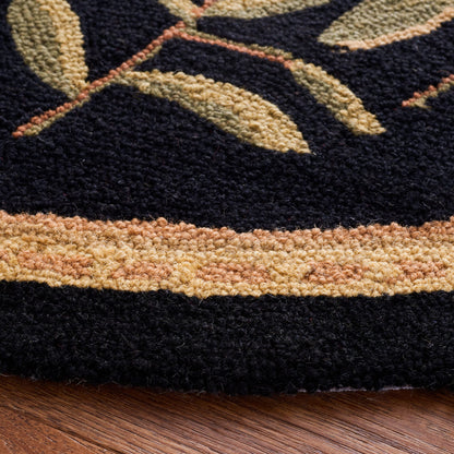 SAFAVIEH Chelsea Collection Area Rug - 4'6" x 6'6" Oval, Black, Hand-Hooked French Country Wool, Ideal for High Traffic Areas in Living Room, Bedroom (HK210B)