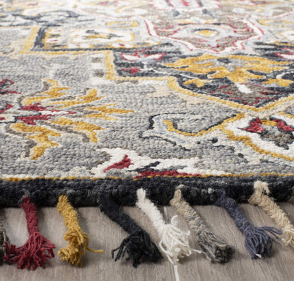 SAFAVIEH Aspen Collection Area Rug - 7' Square, Grey & Charcoal, Handmade Boho Braided Tassel Wool, Ideal for High Traffic Areas in Living Room, Bedroom (APN207F)
