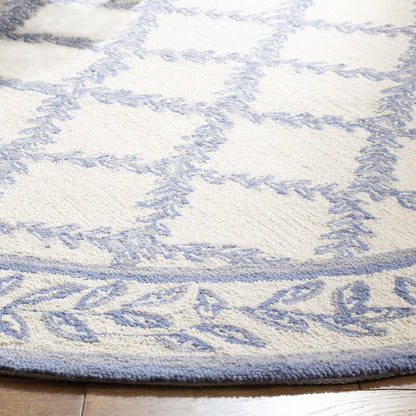 SAFAVIEH Chelsea Collection Area Rug - 4'6" x 6'6" Oval, Ivory & Light Blue, Hand-Hooked French Country Wool, Ideal for High Traffic Areas in Living Room, Bedroom (HK230A)