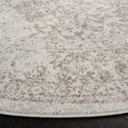 SAFAVIEH Evoke Collection Area Rug - 5' x 8' Oval, Ivory & Taupe, Distressed Design, Non-Shedding & Easy to Clean, Ideal for Living Room, Bedroom, Dining Space (EVK256E)