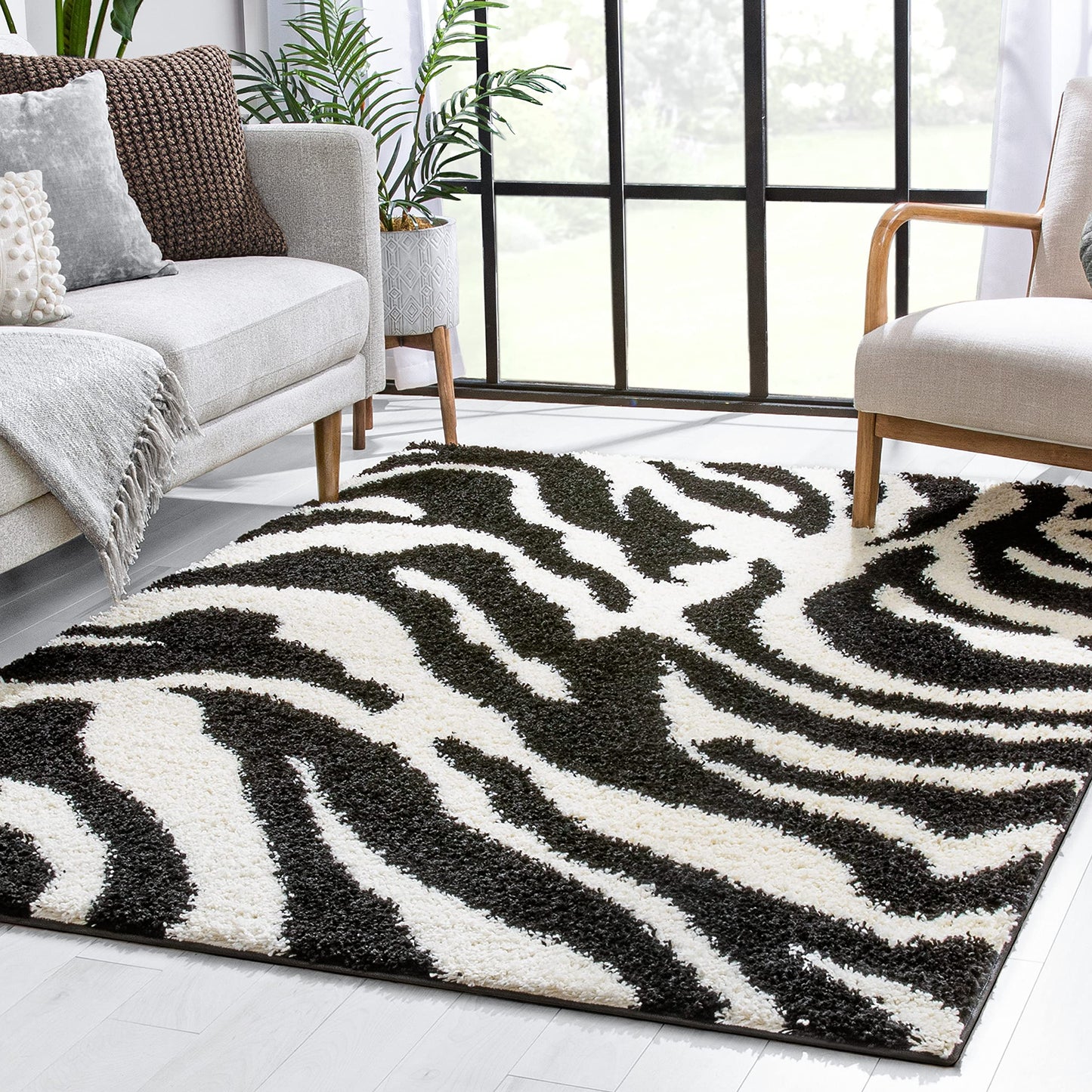 ruglots Modern Animal Print Area Rug Shag Zebra Black & Ivory Plush Easy Care Thick Soft Plush Living Room,3 ft 3 in x 5 ft 3 in