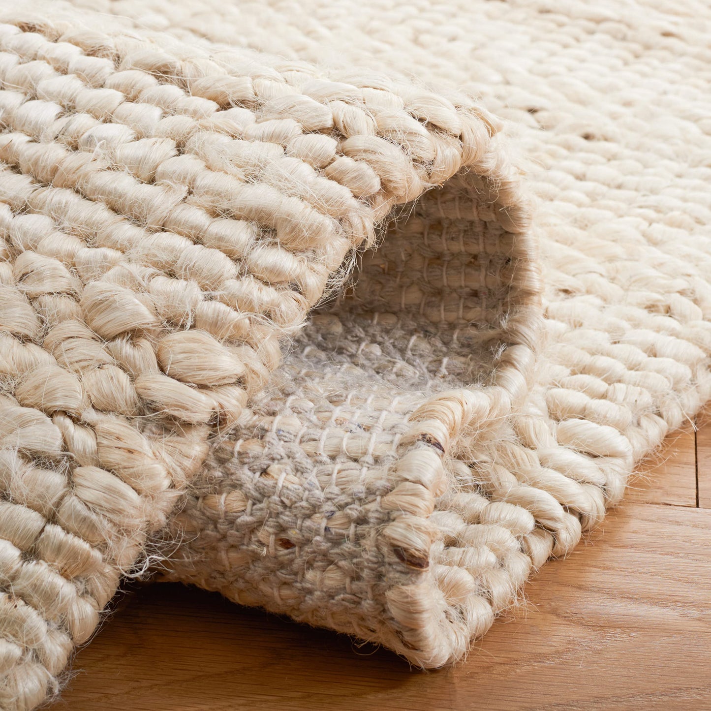 SAFAVIEH Natural Fiber Collection Area Rug - 9' x 12', Bleach, Handmade Jute, Braided Woven Design, Ideal for Living Room, Bedroom (NF212D)