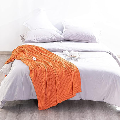 NTBAY 100% Pure Cotton Cable Knit Throw Blanket, Super Soft Warm 51x67 Knitted Throw Blanket for Couch, Sofa, Chair, Bed - Extra Cozy, Machine Washable, Comfortable Home Decor, Orange
