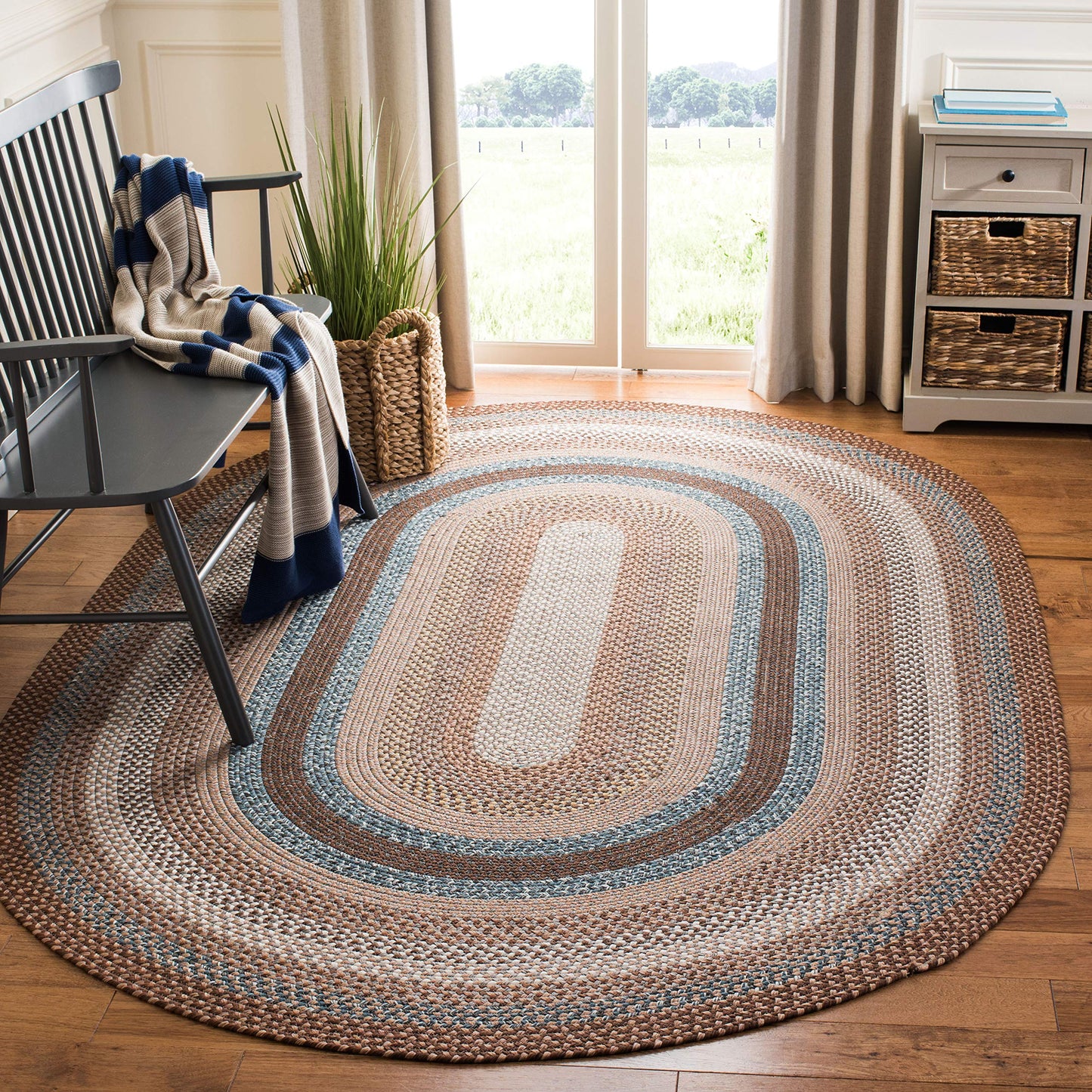 SAFAVIEH Washable Rug Outdoor Braided Collection - 7'x 10', Brown & Multi, Handmade & Reversible, Non-Shedding & Easy to Clean, Ideal for Patio, Backyard, Mudroom (BRD313A)