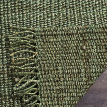 SAFAVIEH Natural Fiber Collection Area Rug - 5' x 8', Green, Handmade Boho Fringe Woven Jute, Ideal for High Traffic Areas in Living Room, Bedroom (NF368G)