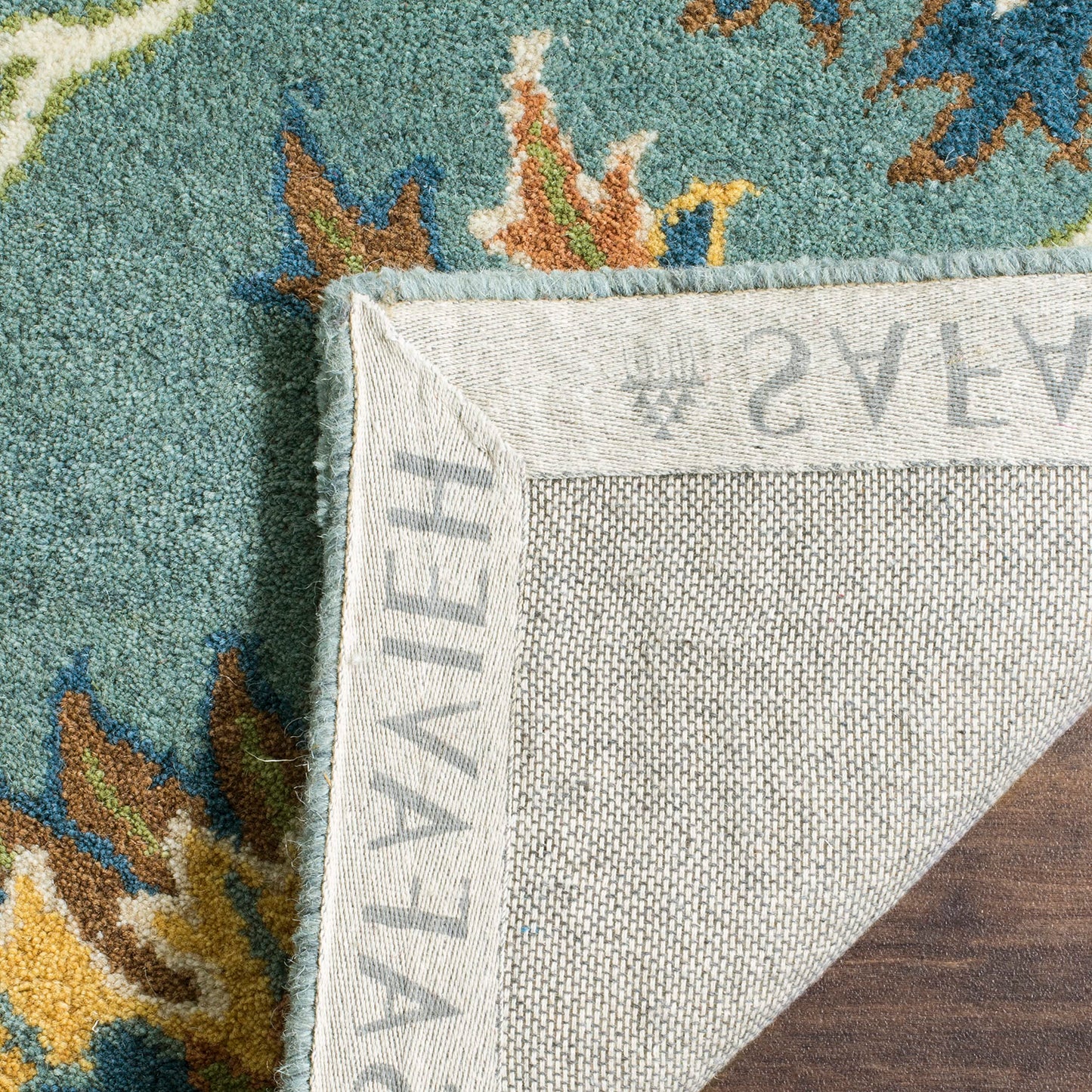 SAFAVIEH Heritage Collection Area Rug - 6' x 9', Light Blue, Handmade Traditional Oriental Wool, Ideal for High Traffic Areas in Living Room, Bedroom (HG651A)