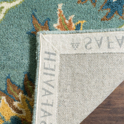SAFAVIEH Heritage Collection Area Rug - 6' x 9', Light Blue, Handmade Traditional Oriental Wool, Ideal for High Traffic Areas in Living Room, Bedroom (HG651A)