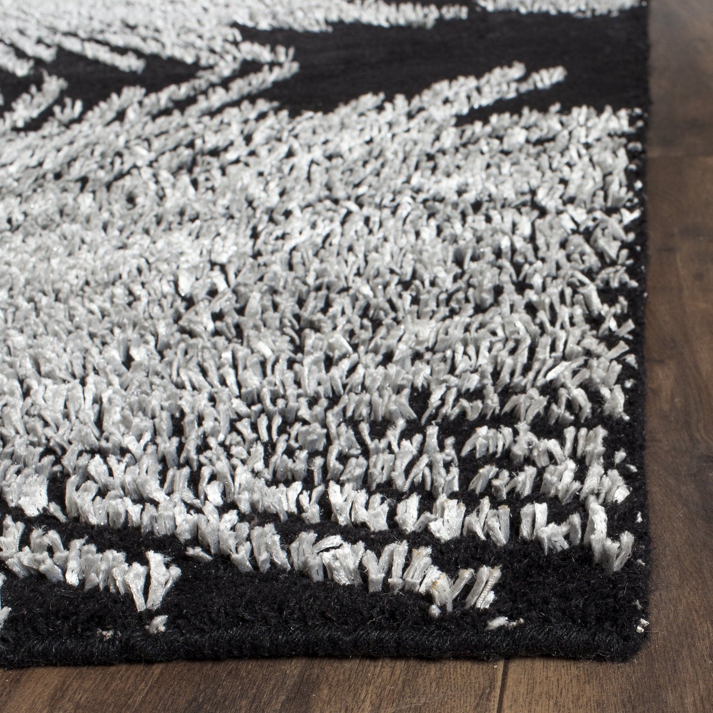 SAFAVIEH Soho Collection 5' x 8' Black / White SOH712D Handmade Starburst Premium Wool & Viscose Area Rug
