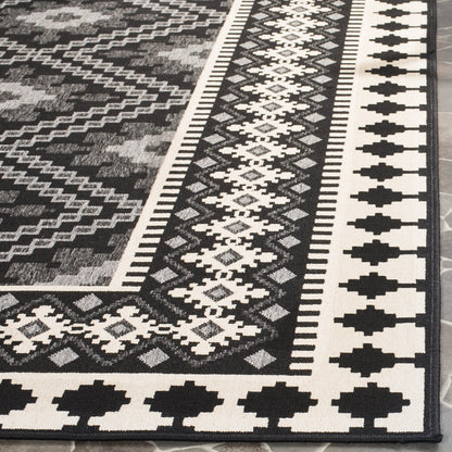 SAFAVIEH Washable Rug Outdoor Veranda Collection - 8' x 11', Black & Cream, Non-Shedding & Easy to Clean, Ideal for Patio, Backyard, Mudroom (VER099-0421)