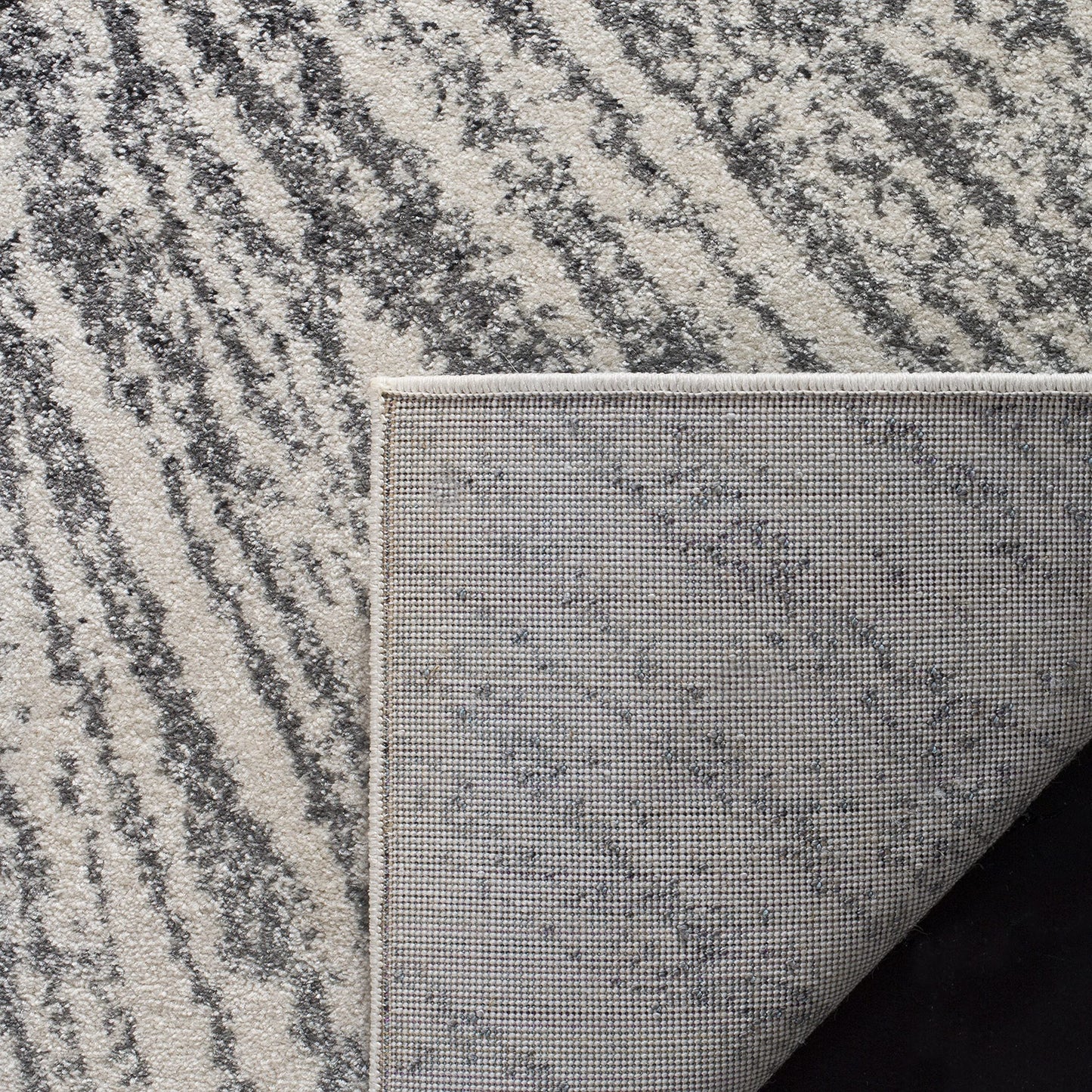 SAFAVIEH Evoke Collection Area Rug - 6'7" Square, Black & Ivory, Abstract Burst Design, Non-Shedding & Easy Care, Ideal for High Traffic Areas in Living Room, Bedroom (EVK228K)