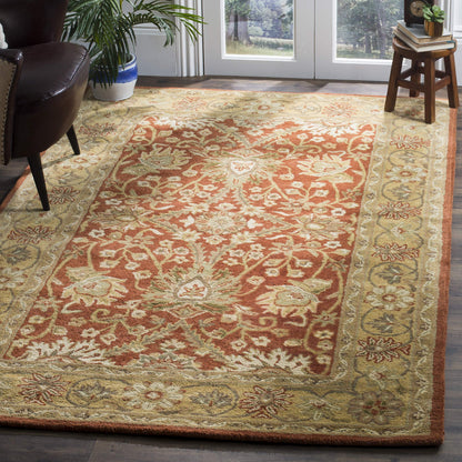 SAFAVIEH Antiquity Collection Accent Rug - 3' x 5', Rust & Gold, Handmade Traditional Oriental Wool, Ideal for High Traffic Areas in Entryway, Living Room, Bedroom (AT249C)
