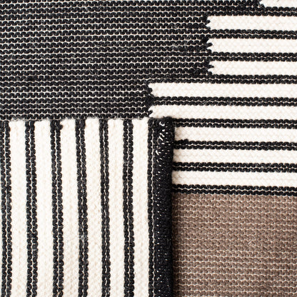 SAFAVIEH Kenya Collection Accent Rug - 4' x 6', Black & Ivory, Handmade Southwestern Wool, Ideal for High Traffic Areas in Entryway, Living Room, Bedroom (KNY278Z)