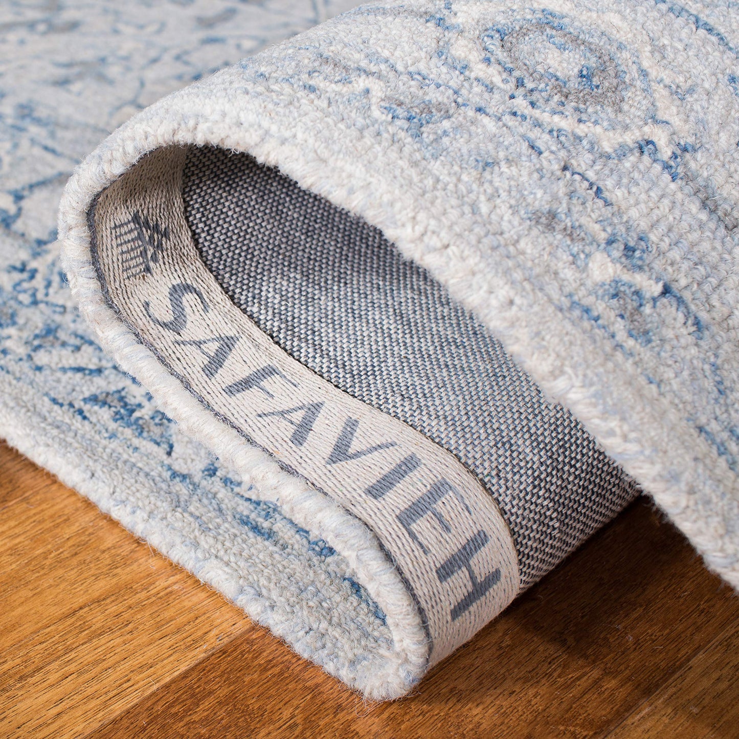 SAFAVIEH Micro-Loop Collection Accent Rug - 2'3" x 5', Light Blue & Ivory, Handmade Shabby Chic Wool, Ideal for High Traffic Areas in Entryway, Living Room, Bedroom (MLP504M)