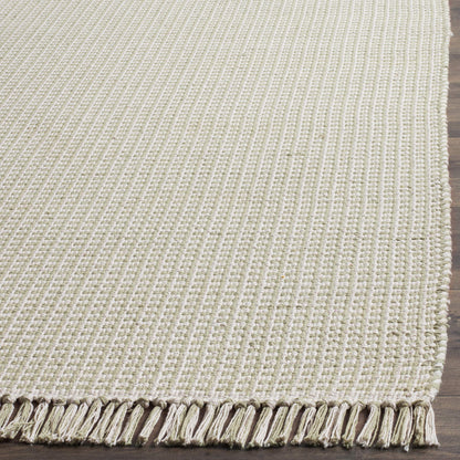 SAFAVIEH Montauk Collection Area Rug - 6' x 9', Ivory & Green, Handmade Flat Weave Boho Farmhouse Cotton Tassel Fringe, Ideal for High Traffic Areas in Living Room, Bedroom (MTK340G)