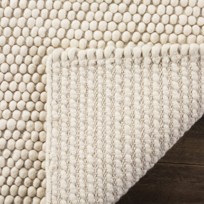 SAFAVIEH Natura Collection Accent Rug - 2'3" x 4', Ivory, Handmade Wool Blend, Textured Design, Ideal for Hallway, Bedroom, Foyer (NAT620A)