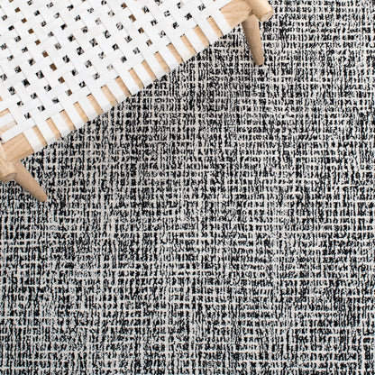 SAFAVIEH Abstract Collection Area Rug - 10' x 14', Black & Ivory, Handmade Wool, Ideal for High Traffic Areas in Living Room, Bedroom (ABT468Z)