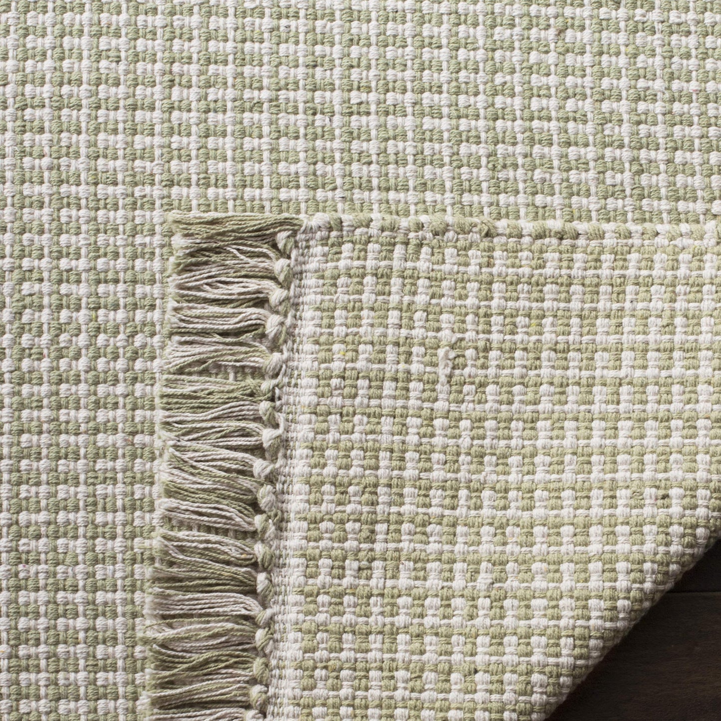 SAFAVIEH Montauk Collection Area Rug - 6' x 9', Ivory & Green, Handmade Flat Weave Boho Farmhouse Cotton Tassel Fringe, Ideal for High Traffic Areas in Living Room, Bedroom (MTK340G)