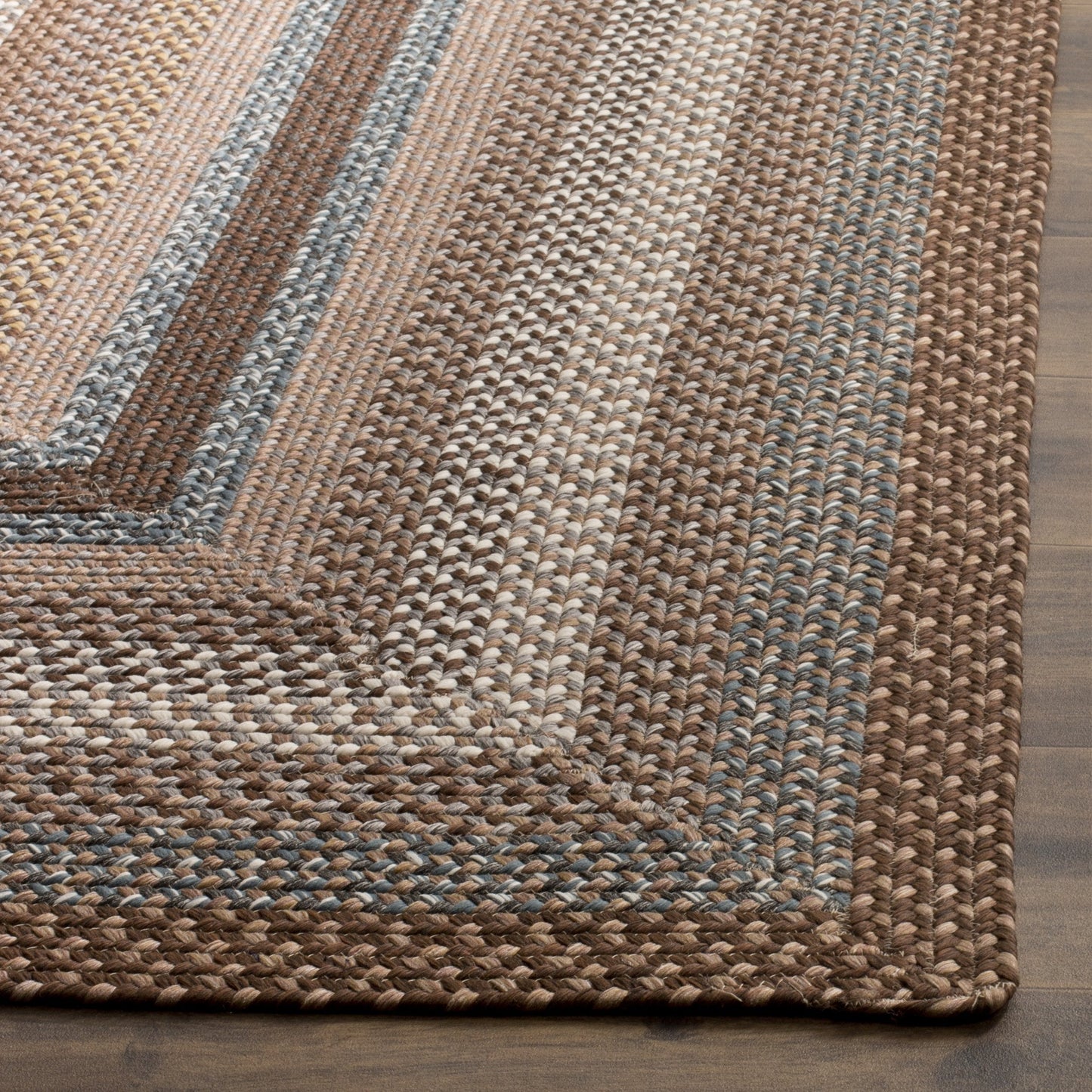 SAFAVIEH Washable Rug Outdoor Braided Collection - 7'x 10', Brown & Multi, Handmade & Reversible, Non-Shedding & Easy to Clean, Ideal for Patio, Backyard, Mudroom (BRD313A)