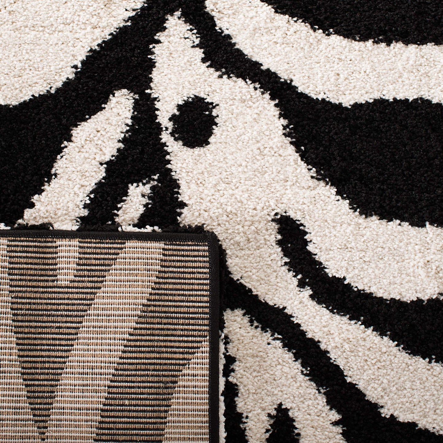 SAFAVIEH Florida Shag Collection Area Rug - 5'3" x 7'6", Ivory & Black, Zebra Print Design, Non-Shedding & Easy Care, 1.2-inch Thick Ideal for High Traffic Areas in Living Room, Bedroom (SG452-1290)