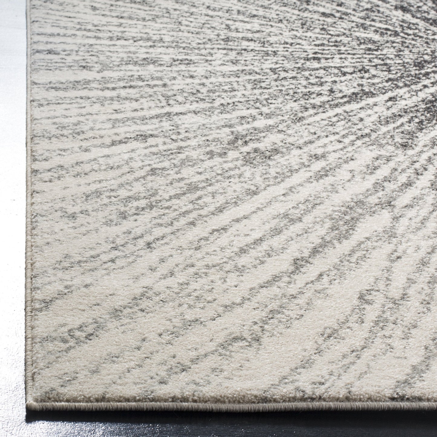 SAFAVIEH Evoke Collection Area Rug - 6'7" Square, Black & Ivory, Abstract Burst Design, Non-Shedding & Easy Care, Ideal for High Traffic Areas in Living Room, Bedroom (EVK228K)