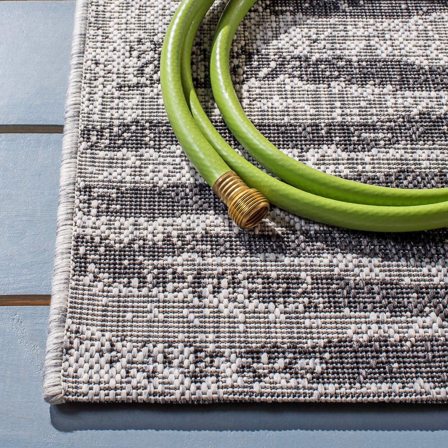 SAFAVIEH Washable Rug Outdoor Courtyard Collection - 4' x 5'7", Grey & Black, Zebra Print Design, Non-Shedding & Easy Cleaning, Ideal for Patio, Backyard, Mudroom (CY8551-37612)