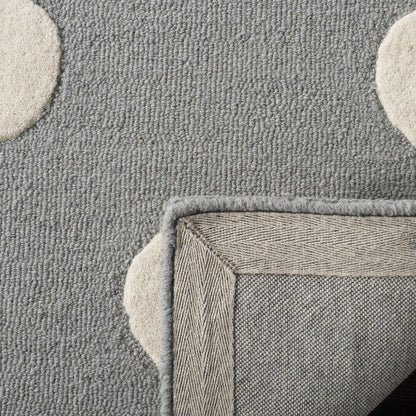 SAFAVIEH Kids Collection Area Rug - 5' x 7', Grey & Ivory, Handmade Polka Dot Wool, Ideal for High Traffic Areas in Living Room, Bedroom (SFK904C)